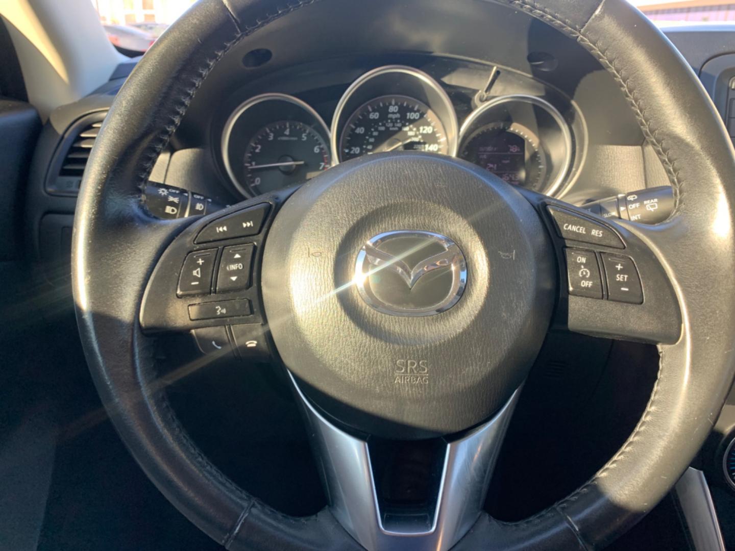 2014 Blue /Tan Mazda CX-5 Touring (JM3KE2CY1E0) with an 2.5L L4 DOHC 16V engine, Automatic transmission, located at 1830 North Belt Line Road, Irving, TX, 75061, (469) 524-0199, 32.834373, -96.993584 - Photo#14